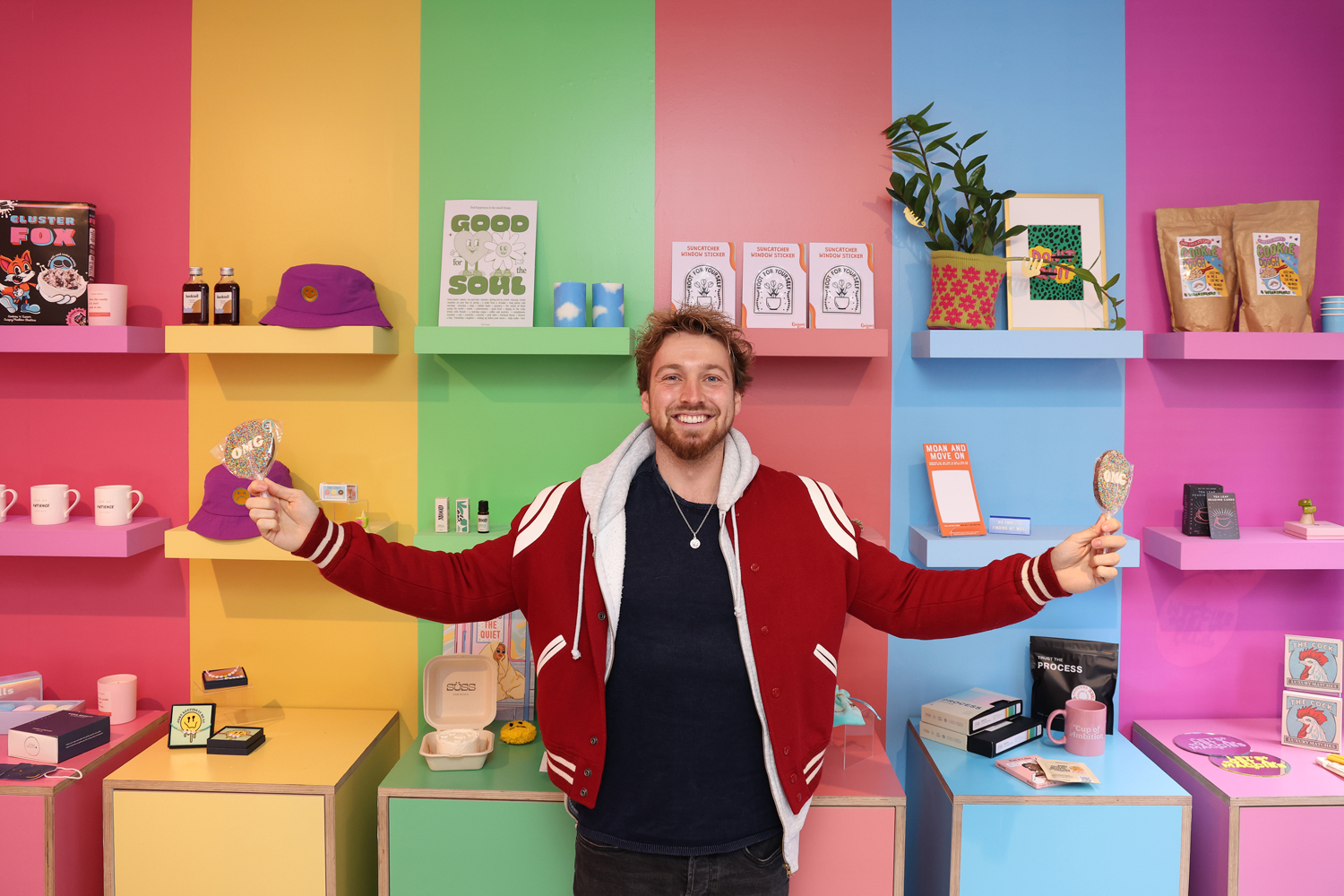 Photograph of a man inside the FML store